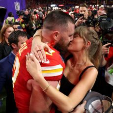 Taylor Swift and Travis Kelce embrace at the 2024 Super Bowl
