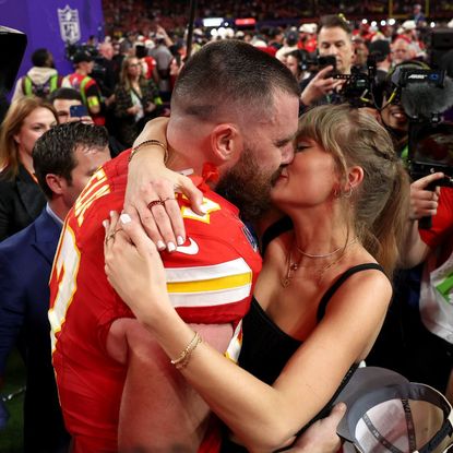 Taylor Swift and Travis Kelce embrace at the 2024 Super Bowl